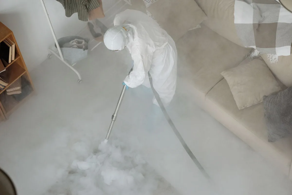 Biohazard cleanup technician in protective equipment, Cold Springs, NV